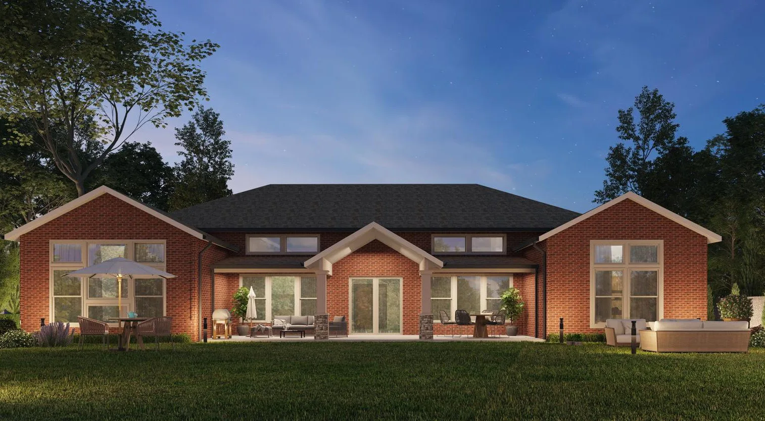 Cottage elevation at dusk with warm-lit windows