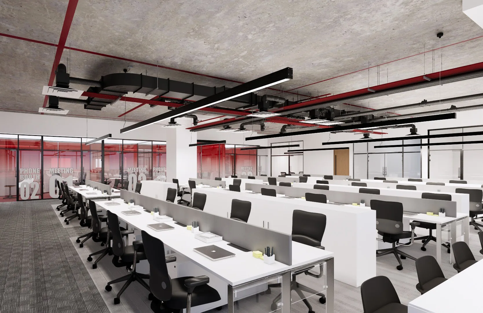 Open office with a red ceiling band above workstations