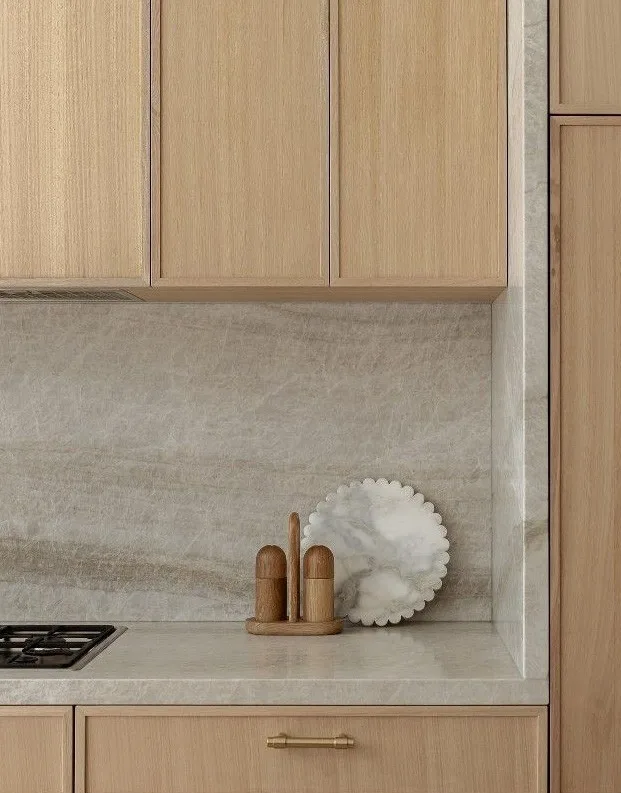 Kitchen counter detail with stone splashback