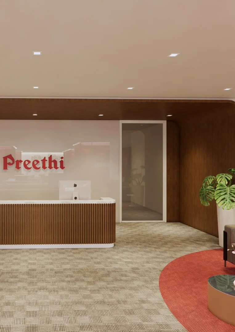 Reception with the studio name on a timber wall and a red carpet