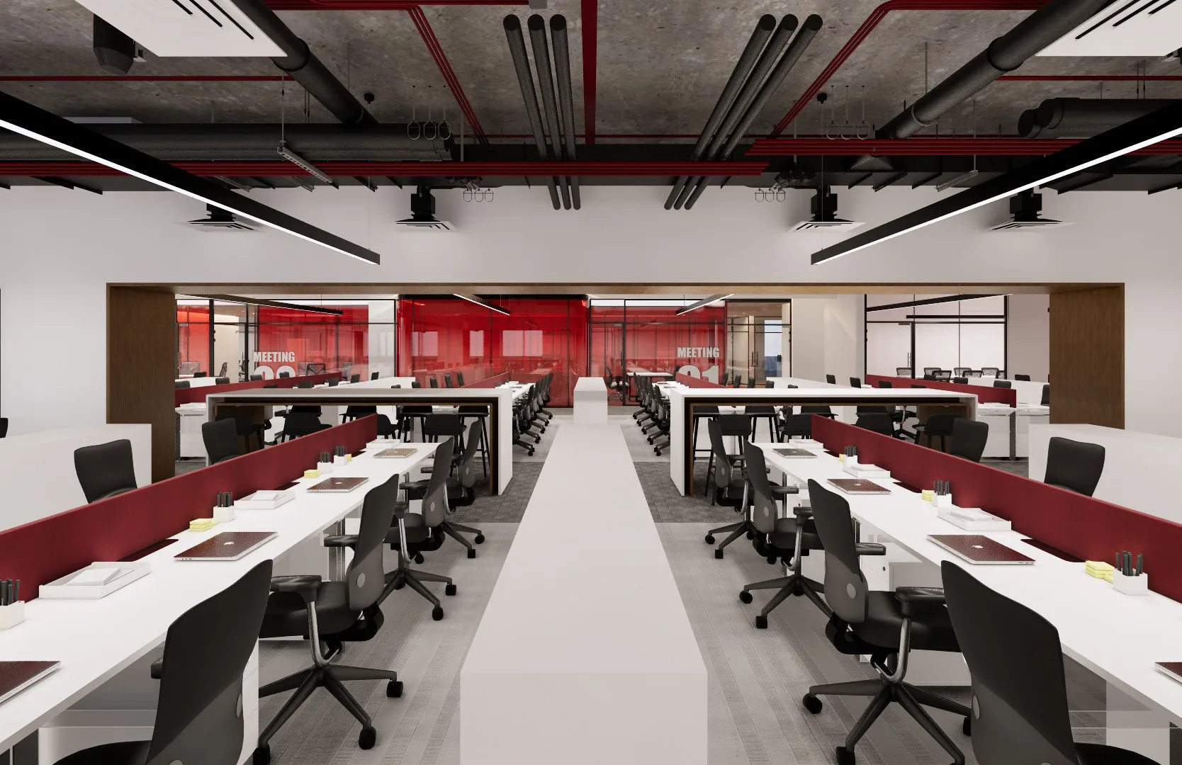 Long white workstation benches with a central aisle under an exposed ceiling